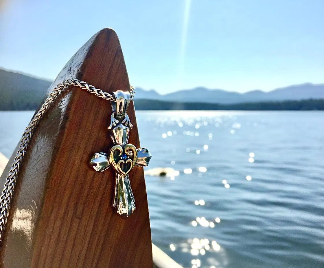 Beautiful Sterling Silver Open Heart Love Cross with Gold Heart and Blue Zircon