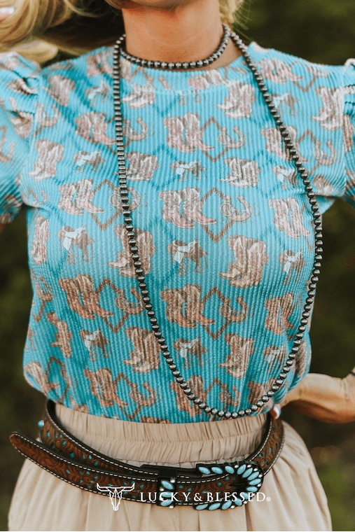 Turquoise Boots Print Puff Sleeve Top